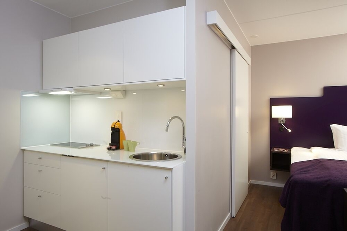 Imagen de la habitación del Hotel Finn Apartments. Foto 11