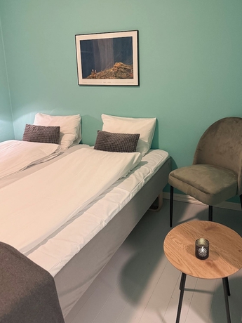 Imagen de la habitación del Hotel Finnholmen Brygge. Foto 16