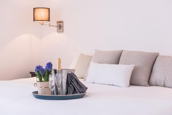 Imagen de la habitación del Hotel Fino and Suites. Foto 16