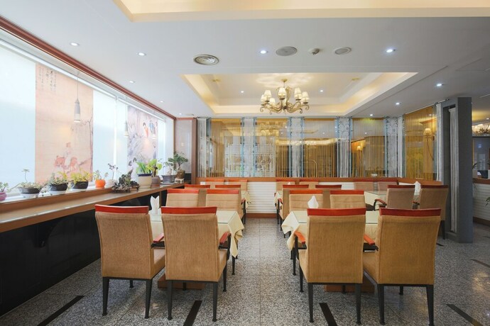 Imagen del bar/restaurante del Hotel Fiore Tourist Hotel. Foto 2