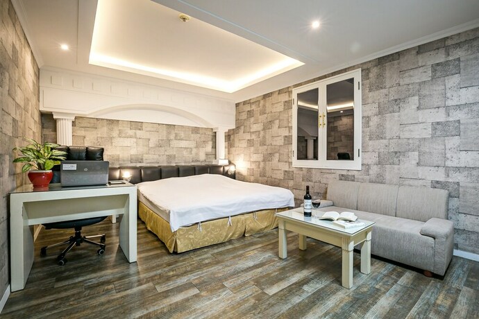 Imagen de la habitación del Hotel Fiore Tourist Hotel. Foto 6