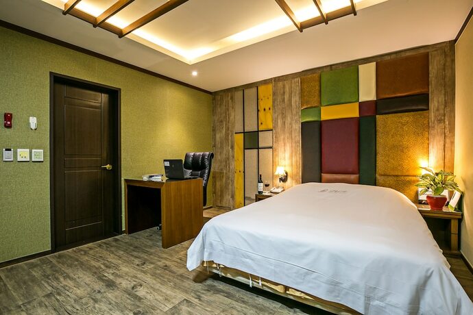 Imagen de la habitación del Hotel Fiore Tourist Hotel. Foto 7