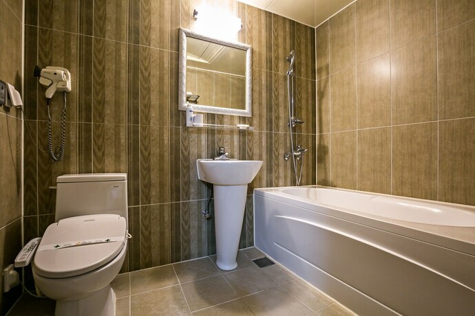 Imagen de la habitación del Hotel Fiore Tourist Hotel. Foto 8