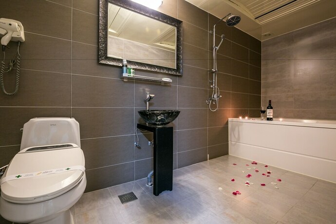 Imagen de la habitación del Hotel Fiore Tourist Hotel. Foto 10