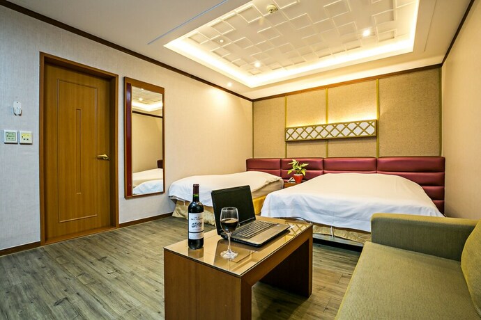 Imagen de la habitación del Hotel Fiore Tourist Hotel. Foto 11