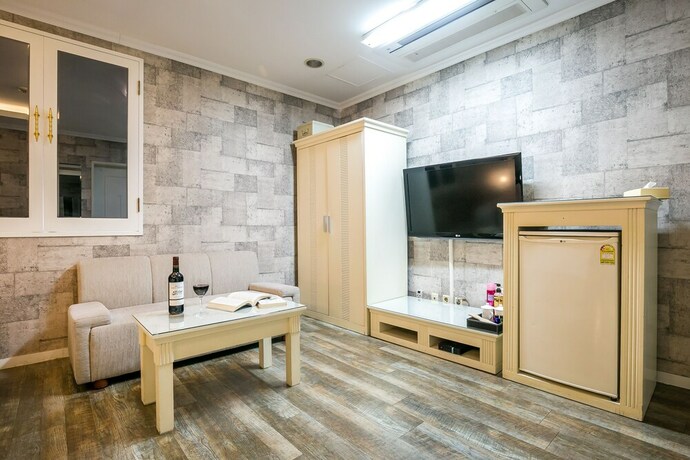Imagen de la habitación del Hotel Fiore Tourist Hotel. Foto 12