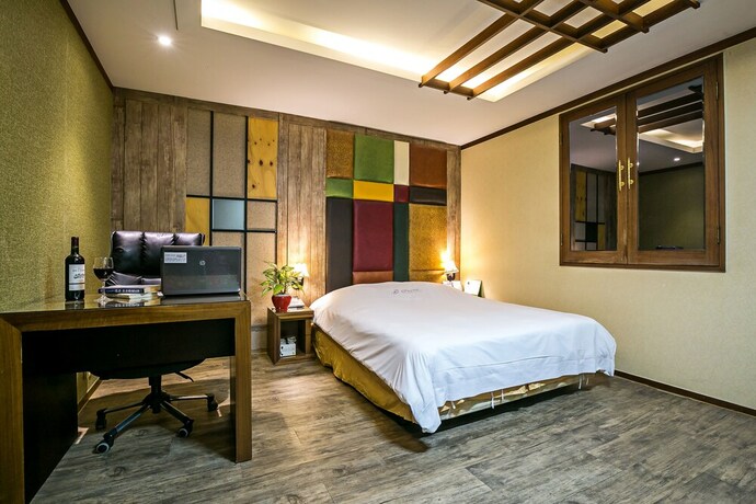 Imagen de la habitación del Hotel Fiore Tourist Hotel. Foto 14