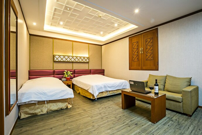 Imagen de la habitación del Hotel Fiore Tourist Hotel. Foto 16