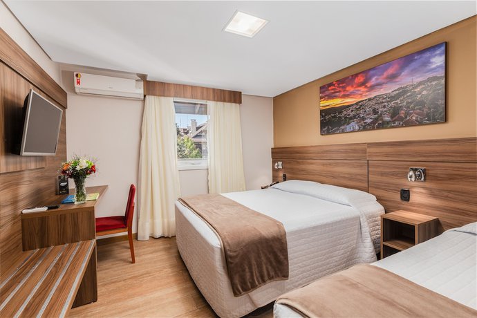 Imagen de la habitación del Hotel Fioreze Centro. Foto 11