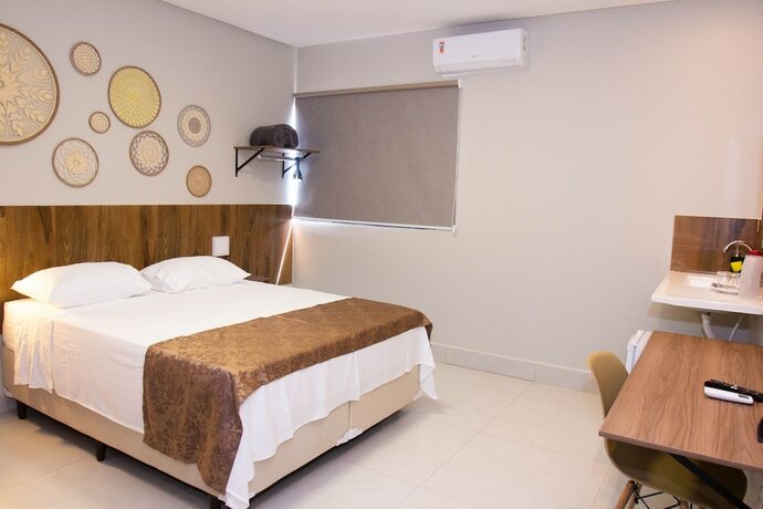 Imagen de la habitación del Hotel Fiori Su&iacute;tes. Foto 12