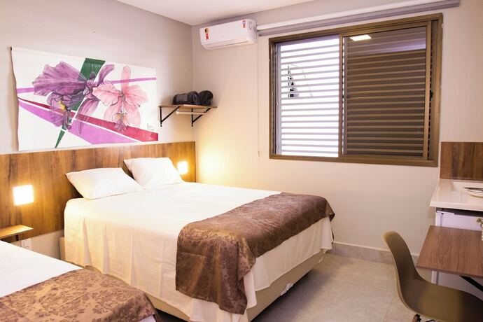 Imagen de la habitación del Hotel Fiori Su&iacute;tes. Foto 16