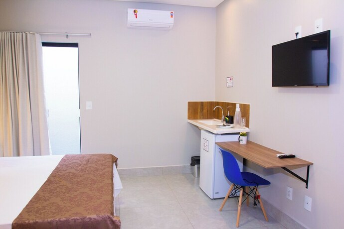 Imagen de la habitación del Hotel Fiori Su&iacute;tes. Foto 19