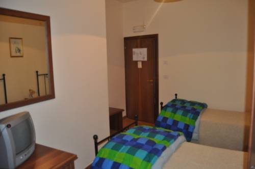 Imagen de la habitación del Hotel Fioriti. Foto 11