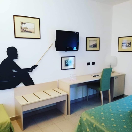 Imagen de la habitación del Hotel Fioroni. Foto 12