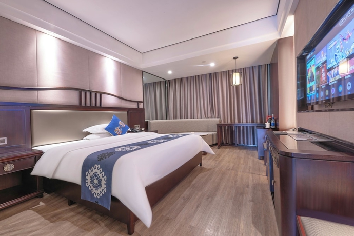 Imagen de la habitación del Hotel Firend He Zhangjiajie. Foto 2