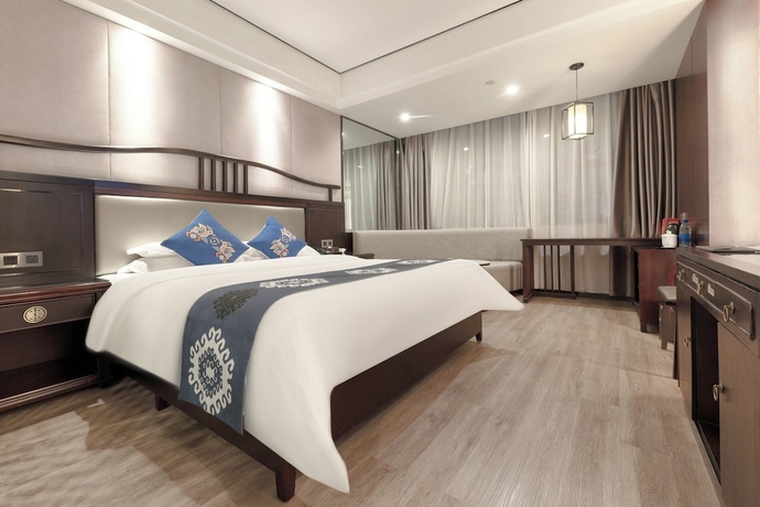 Imagen de la habitación del Hotel Firend He Zhangjiajie. Foto 3