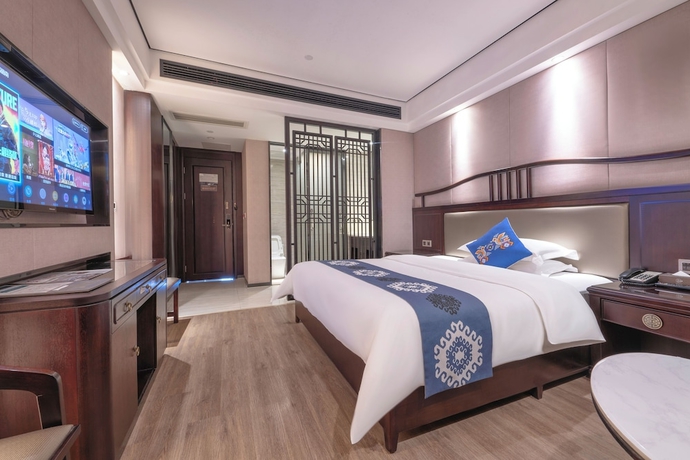 Imagen de la habitación del Hotel Firend He Zhangjiajie. Foto 4