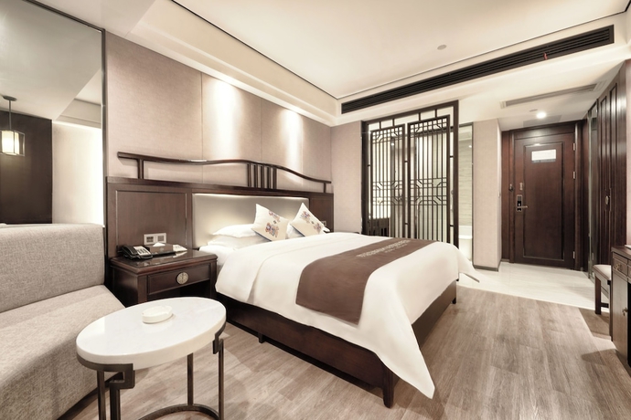 Imagen de la habitación del Hotel Firend He Zhangjiajie. Foto 5