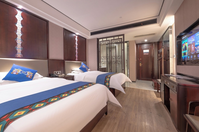 Imagen de la habitación del Hotel Firend He Zhangjiajie. Foto 6