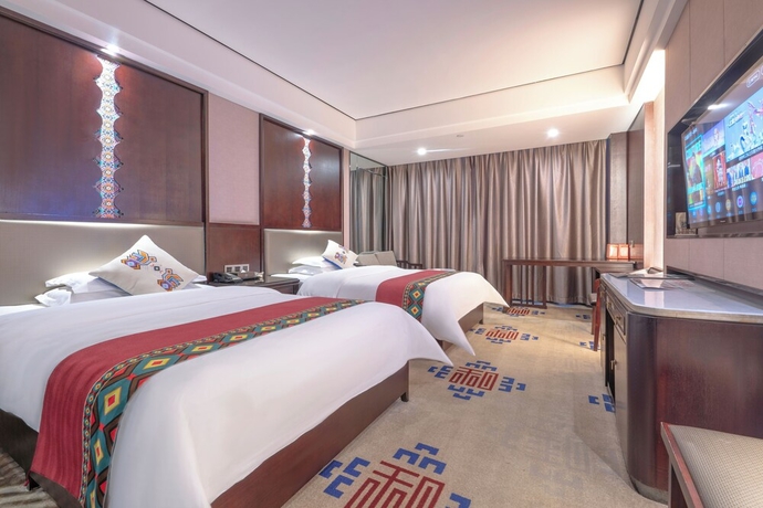 Imagen de la habitación del Hotel Firend He Zhangjiajie. Foto 7