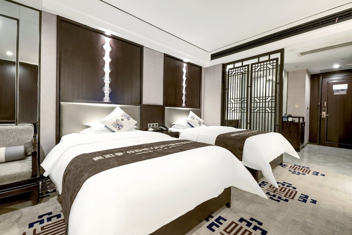 Imagen de la habitación del Hotel Firend He Zhangjiajie. Foto 8