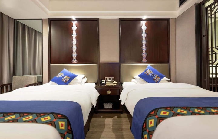 Imagen de la habitación del Hotel Firend He Zhangjiajie. Foto 9