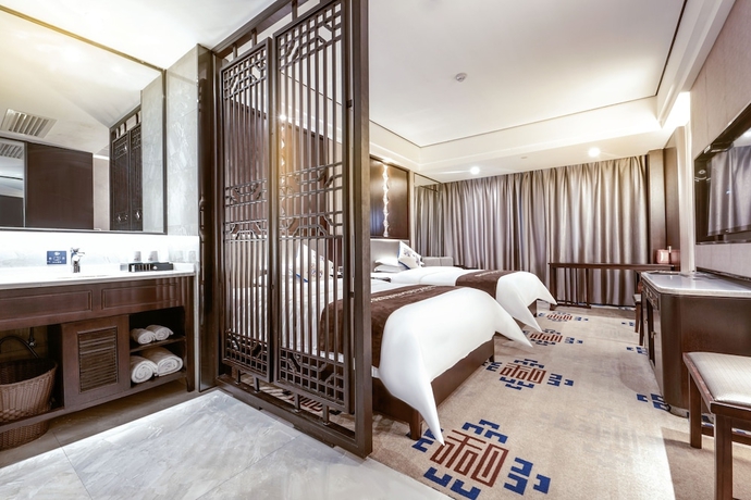 Imagen de la habitación del Hotel Firend He Zhangjiajie. Foto 10