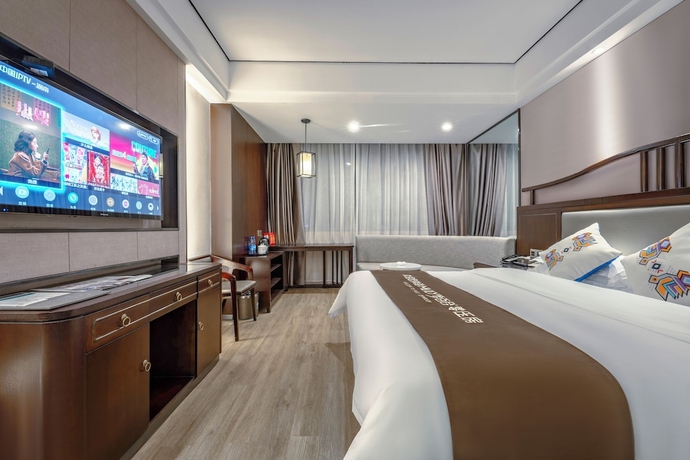 Imagen de la habitación del Hotel Firend He Zhangjiajie. Foto 11