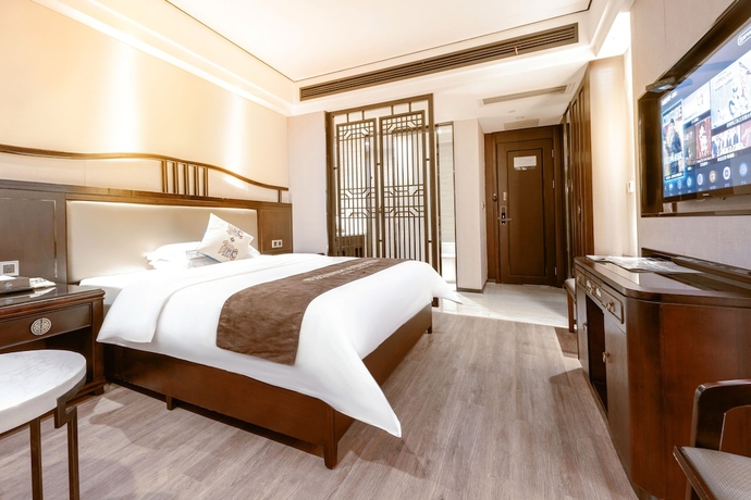 Imagen de la habitación del Hotel Firend He Zhangjiajie. Foto 12
