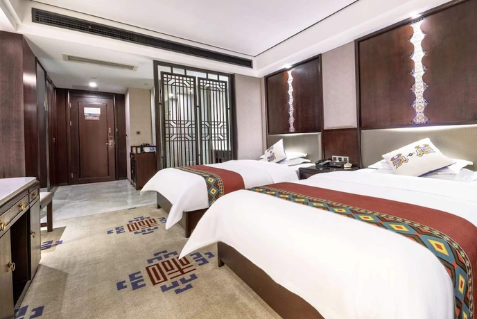 Imagen de la habitación del Hotel Firend He Zhangjiajie. Foto 13