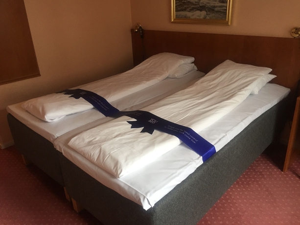 Imagen de la habitación del Hotel First Breiseth. Foto 15