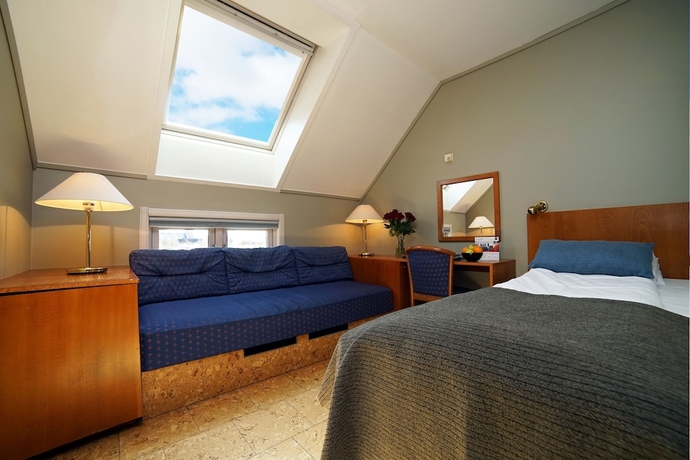 Imagen de la habitación del Hotel First Breiseth. Foto 19