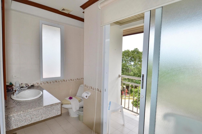 Imagen de la habitación del Hotel First Bungalow Beach Resort. Foto 8