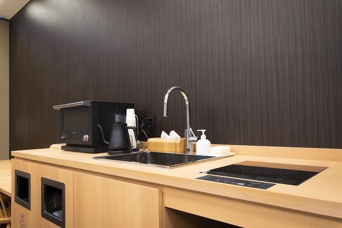 Imagen de la habitación del Hotel First Cabin Kyoto Nijojo. Foto 16
