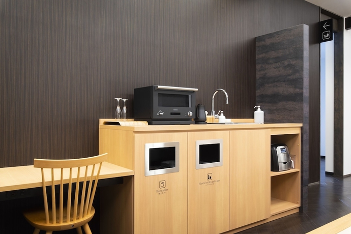 Imagen de la habitación del Hotel First Cabin Kyoto Nijojo. Foto 17