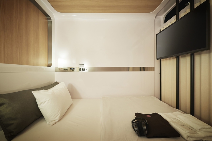 Imagen de la habitación del Hotel First Cabin Nihonbashi Yokoyamacho. Foto 9