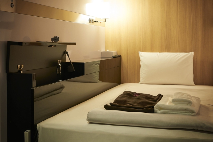 Imagen de la habitación del Hotel First Cabin Nihonbashi Yokoyamacho. Foto 11