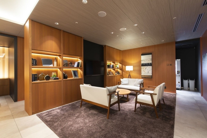 Imagen de los interiores del Hotel First Cabin Station Wakayama Station. Foto 14