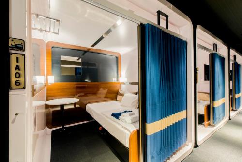 Imagen de la habitación del Hotel First Cabin Station Wakayama-Eki. Foto 8