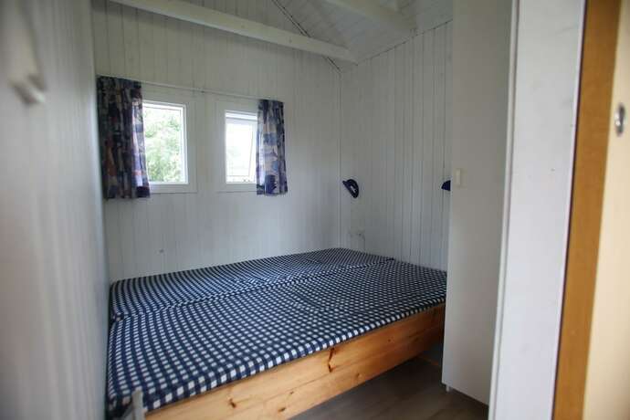 Imagen de la habitación del Hotel First Camp Ajstrup Strand. Foto 8