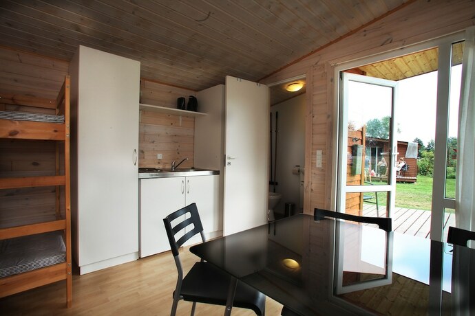 Imagen de la habitación del Hotel First Camp Ajstrup Strand. Foto 14