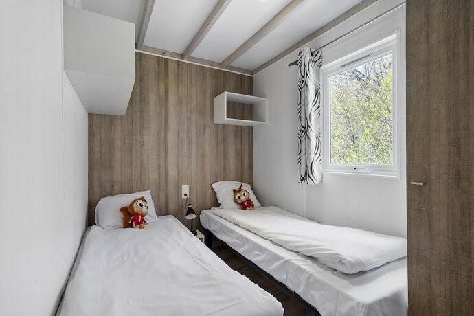 Imagen de la habitación del Hotel First Camp B&oslash;s&oslash;re Strand Fyn. Foto 16