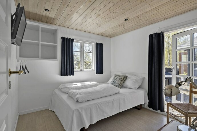 Imagen de la habitación del Hotel First Camp B&oslash;s&oslash;re Strand Fyn. Foto 19