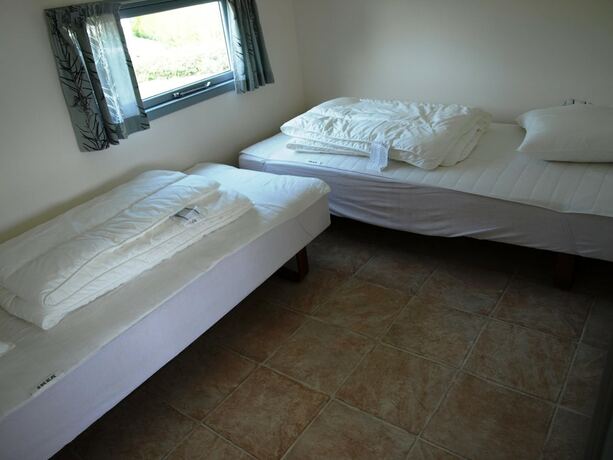 Imagen de la habitación del Hotel First Camp Holb&aelig;k Fjord. Foto 13