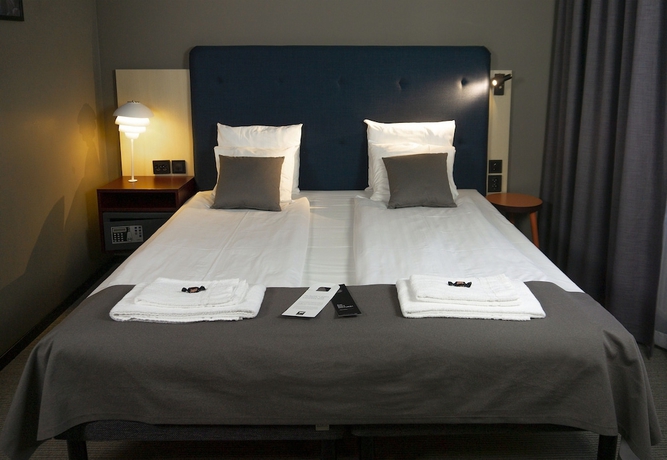 Imagen de la habitación del Hotel First Central. Foto 4