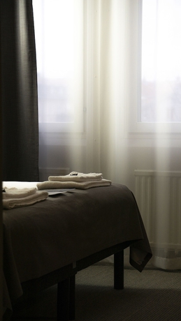 Imagen de la habitación del Hotel First Central. Foto 5