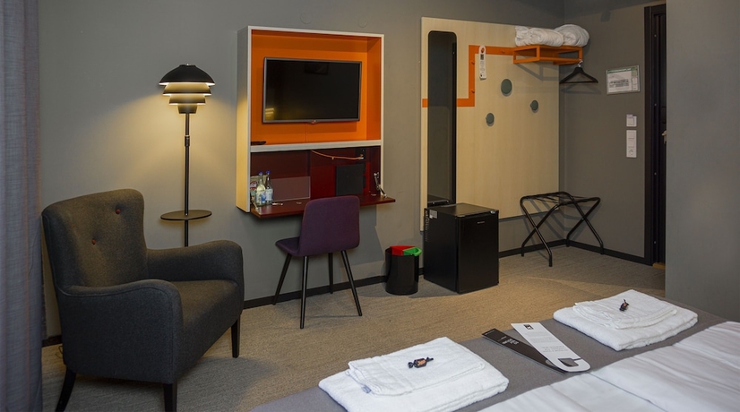 Imagen de la habitación del Hotel First Central. Foto 11