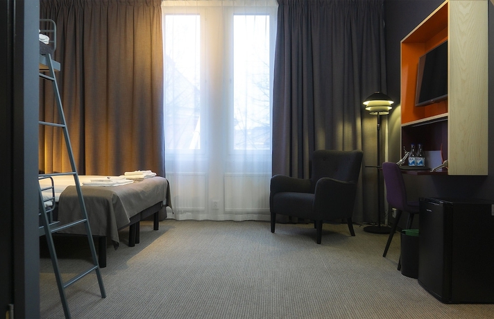 Imagen de la habitación del Hotel First Central. Foto 14