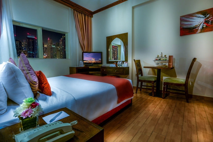 Imagen de la habitación del Hotel First Central Suites. Foto 4