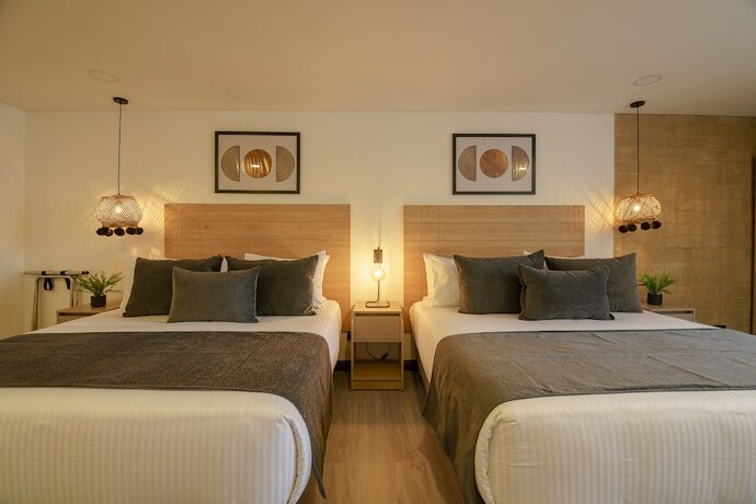 Imagen de la habitación del Hotel First Class. Foto 12